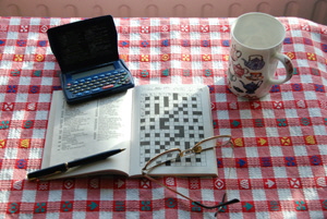 Crossword, spectacles, pen, coffee mug: all ready to go!